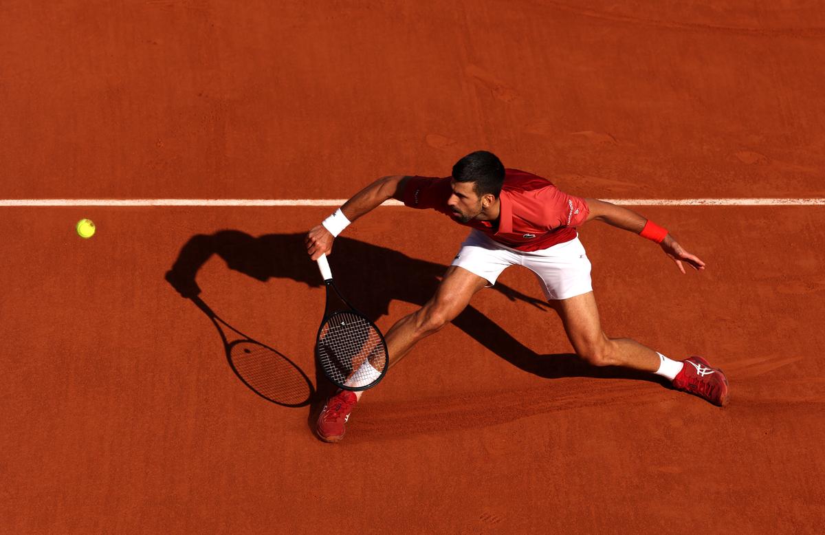 Smooth operator: Rigorous training, starting at an early age, has enabled top sliders like Novak Djokovic to move confidently and effortlessly.